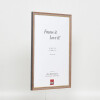 Effetto cornice in legno massiccio profilo 25 noce marrone 27x48 cm vetro antiriflesso