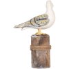 Uccelli decorativi Clayre & Eef su pali di legno Maritime Set di 2 marrone bianco